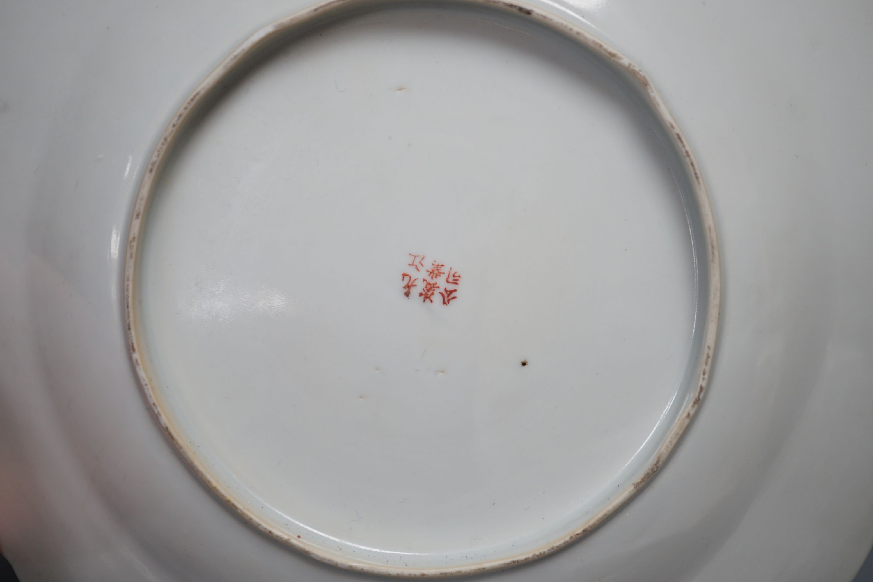 A Chinese blue and white jar, a similar vase, a polychrome plate and a famille verte saucer- plate 25 cms diameter.